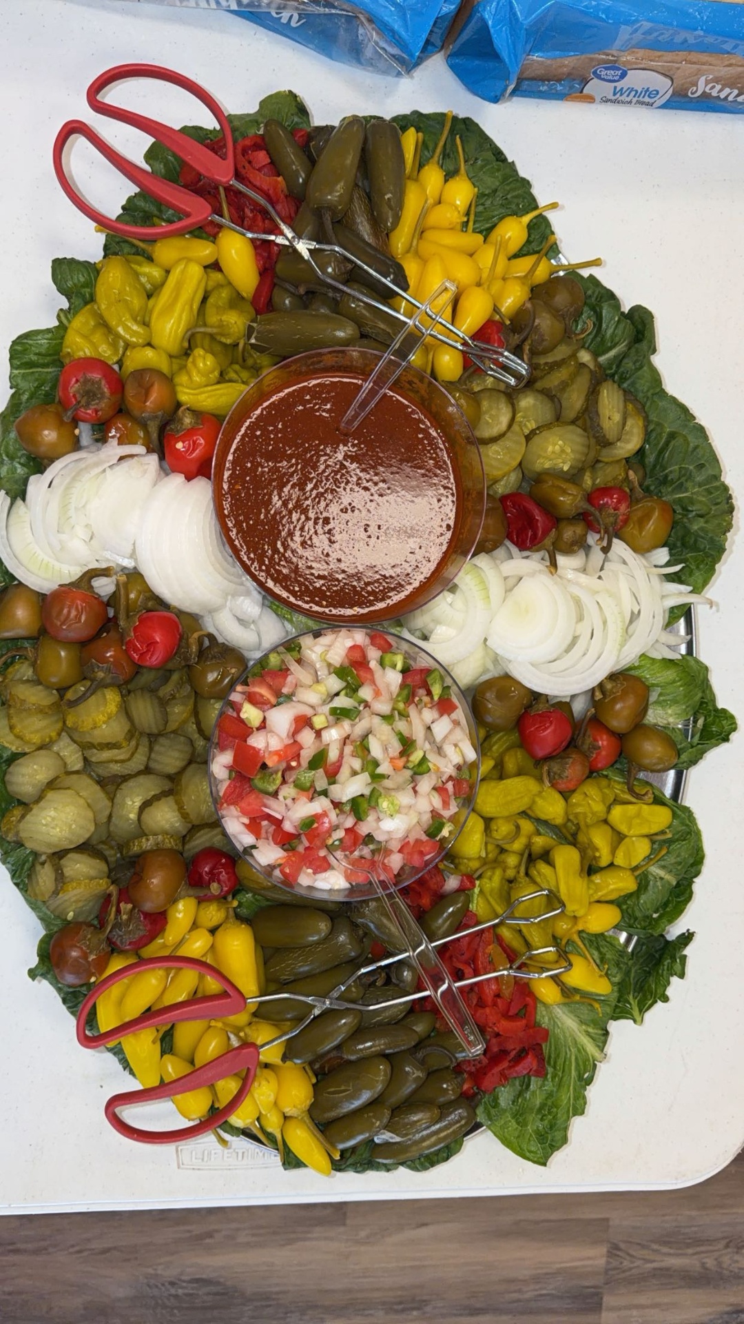 Pickle and pepper bar with pico de gallo and BBQ sauce