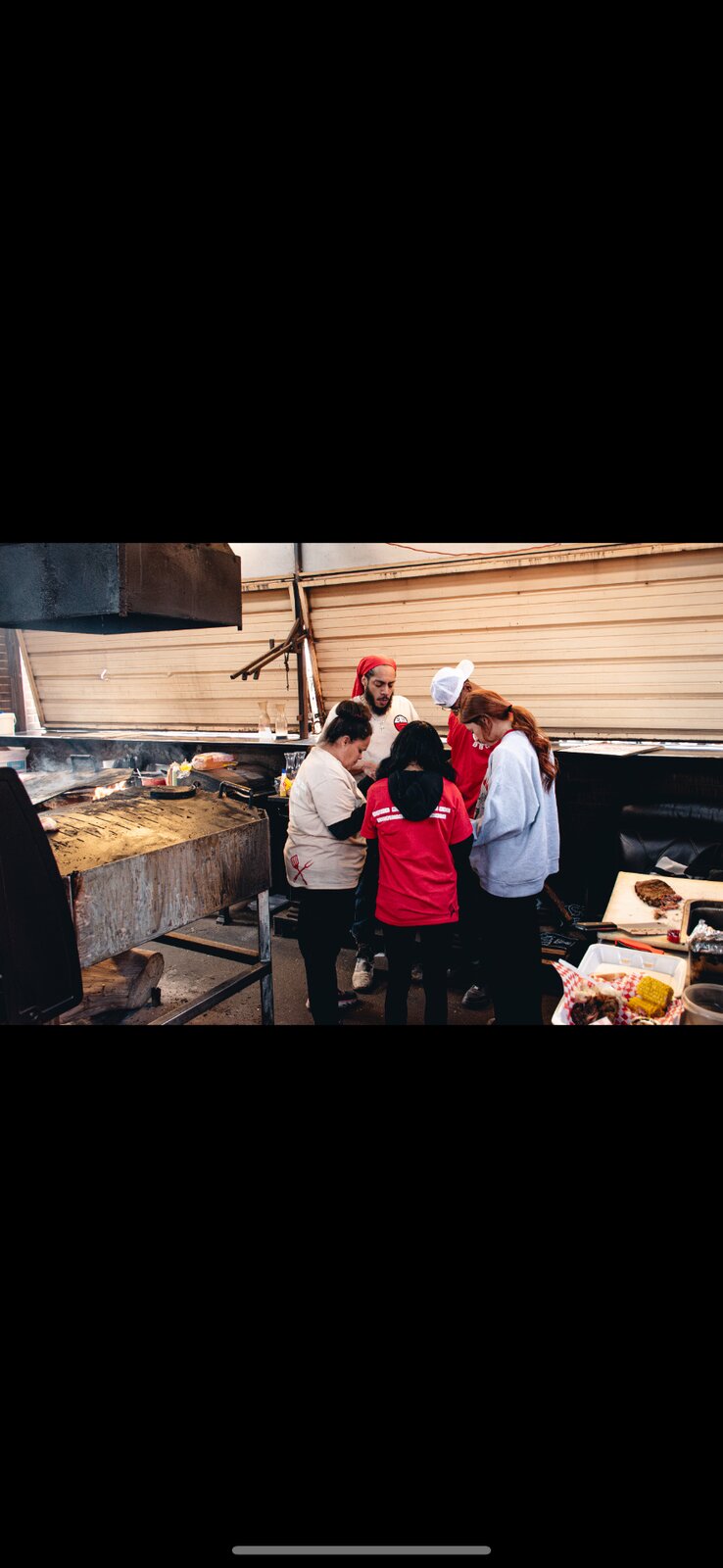 Big E's BBQ family crew at the service window